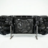 Car radiator and fan assembly on a white background